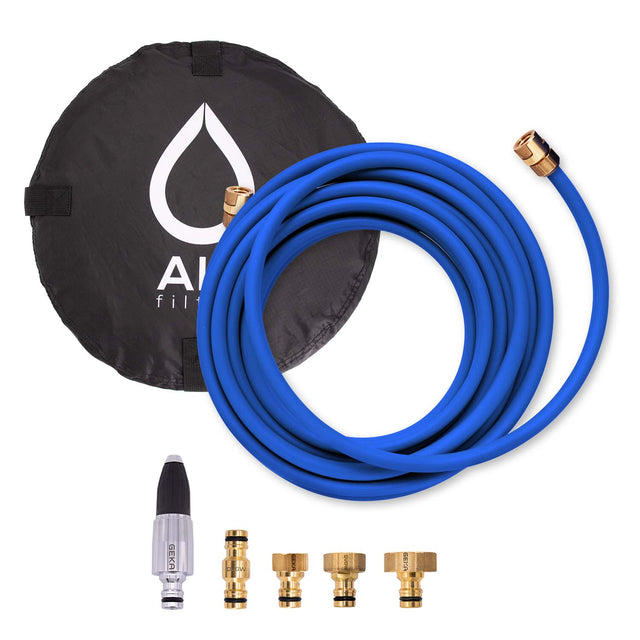 Hose set with tap connector, spray nozzle and coupling in hose bag